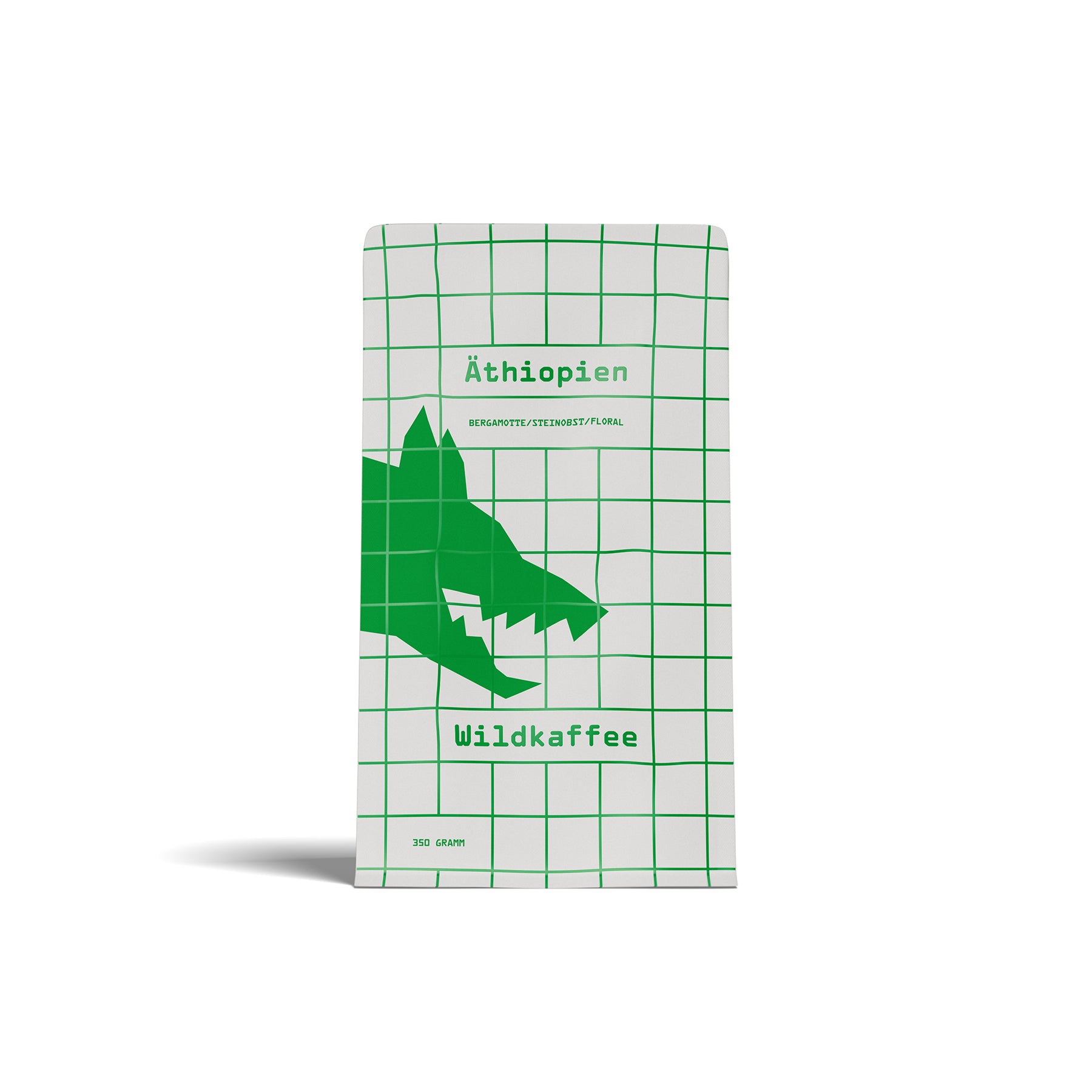 weiße Kaffeepackung mit grünem Raster und grünem Tierkopf
