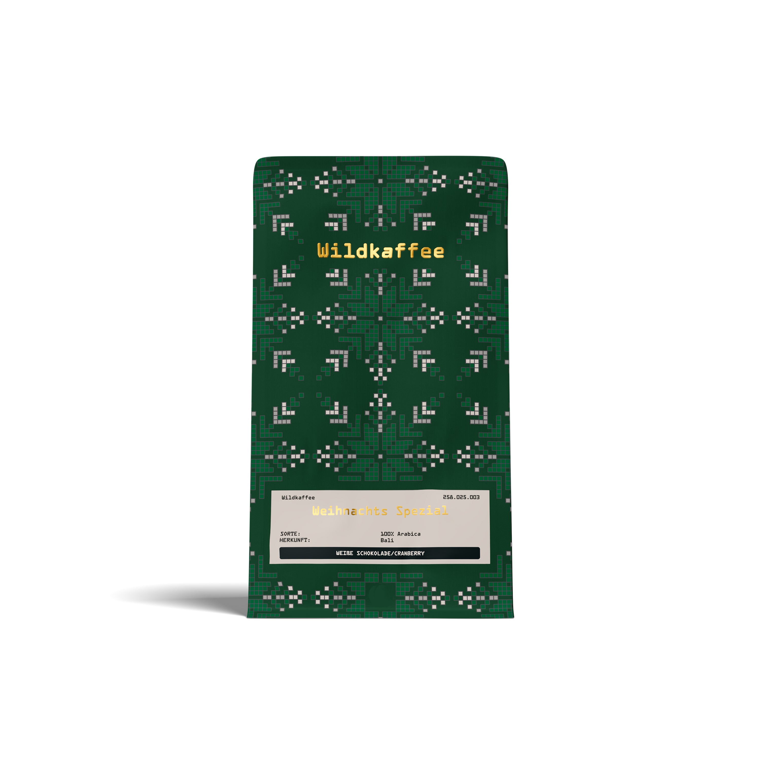 grüne Packung Weihnachtskaffee, weißes Etikett