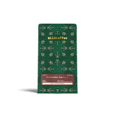 grüne Packung Weihnachtskaffee, braunes Etikett