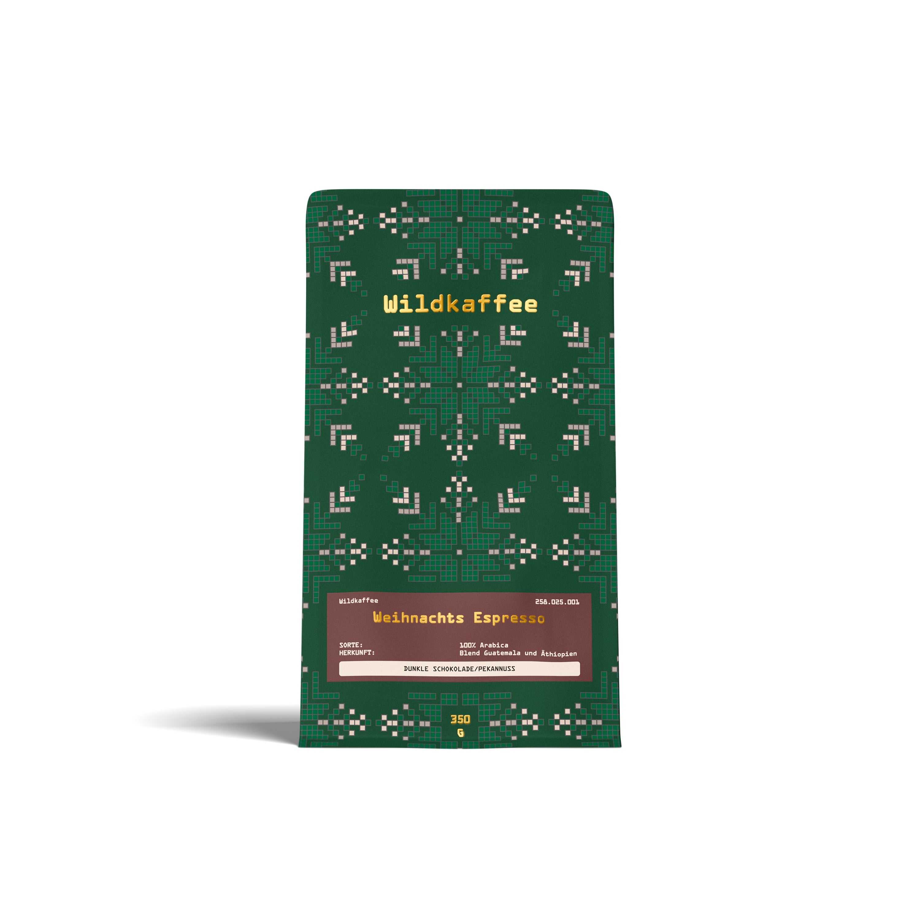 grüne Packung Weihnachtskaffee, braunes Etikett